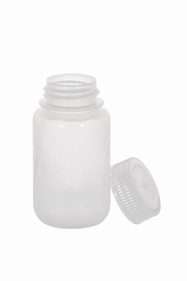 Assortment of plastic and glass reagent bottles in a laboratory