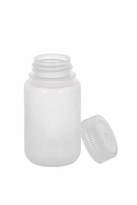 White plastic bottle with cap on a white background