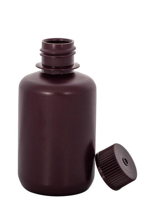 Brown bottle with cap on a white background
