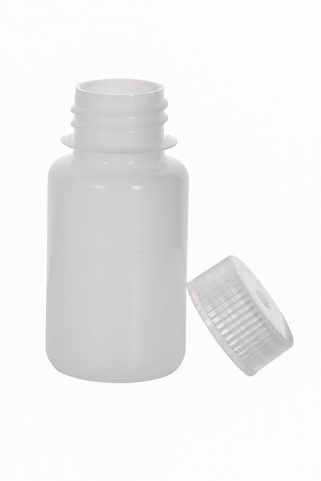 White plastic bottle with cap on a white background