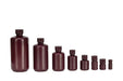 Set of brown bottles of varying sizes on a white background